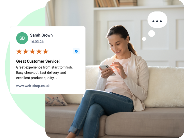Young woman writing a review on her mobile phone.